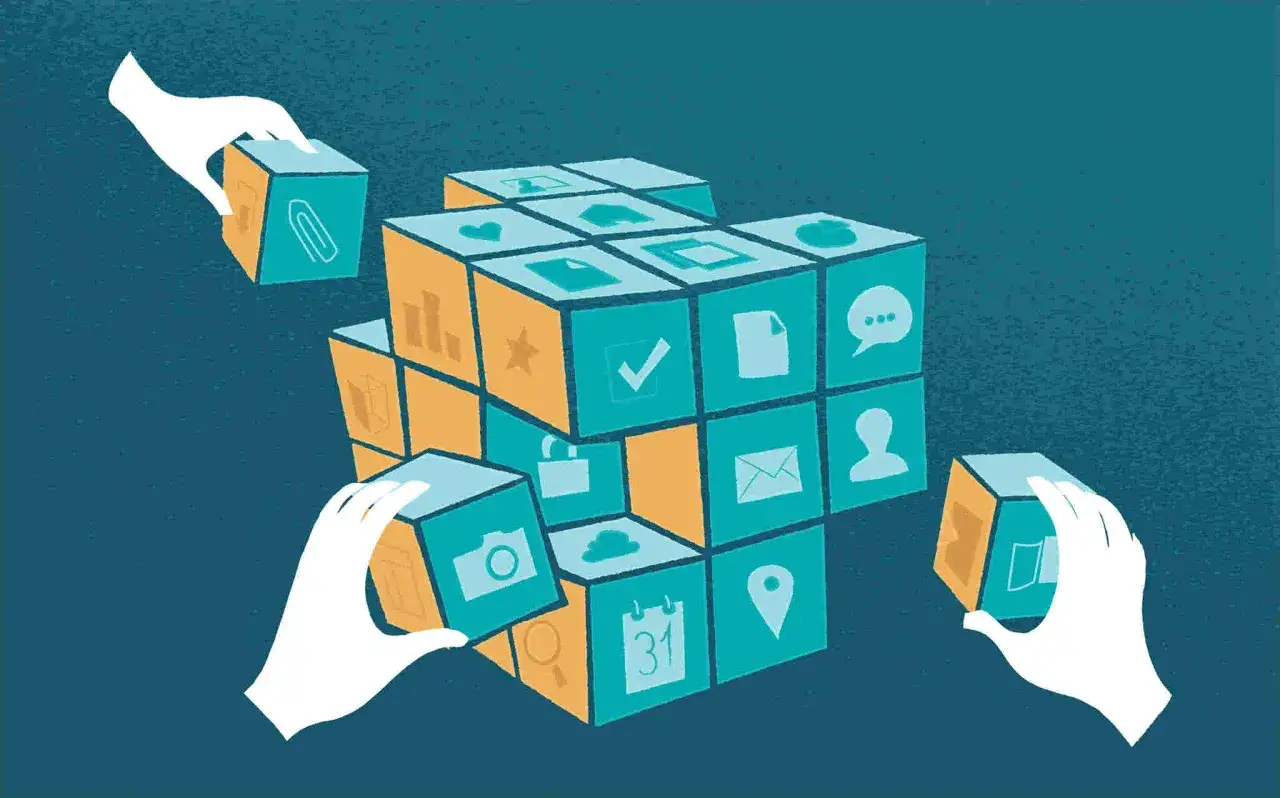 Des mains assemblent des cubes symbolisant des applications. Une pause r&eacute;seaux sociaux pour reconstruire son univers num&eacute;rique.