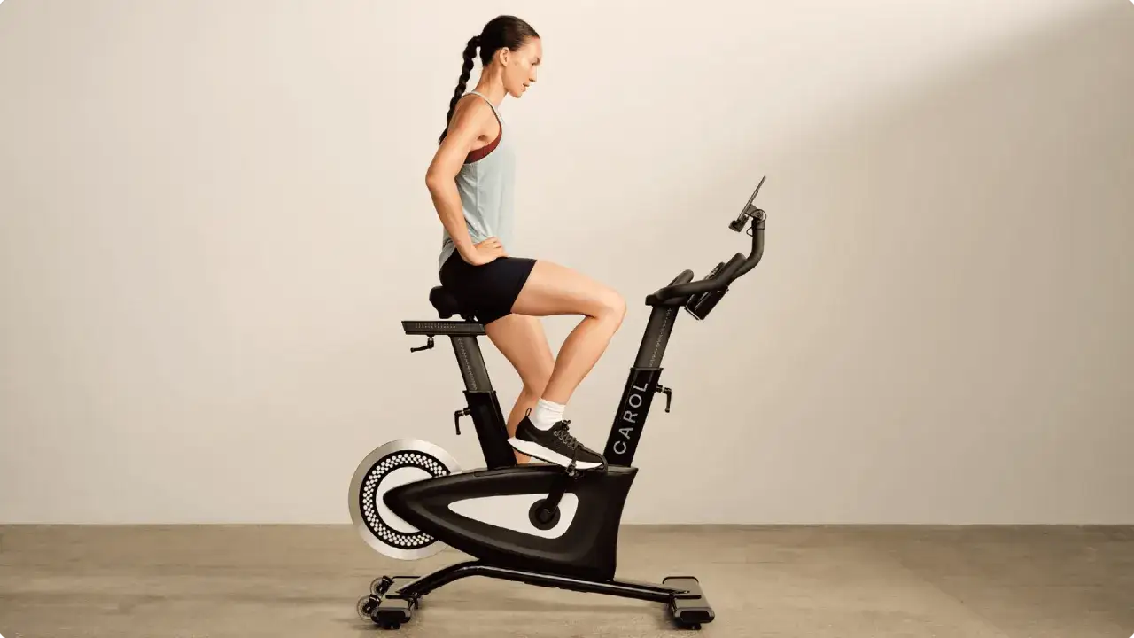 A woman on a CAROL bike, a question for anyone wondering: will indoor cycling help me lose weight?