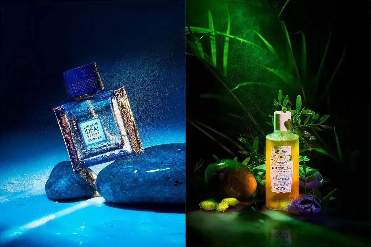 Photographie publicitaire : flacon de parfum Guerlain sur des pierres bleues sous l'eau, et flacon de S.M. Novella dans un d&eacute;cor v&eacute;g&eacute;tal verdoyant.