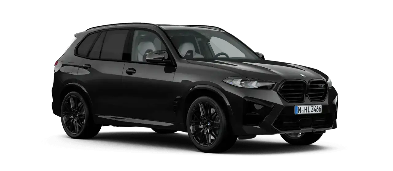 Elegancki, czarny BMW X5M z czarnymi felgami i jasnym wnętrzem, gotowy na podbój drogi.