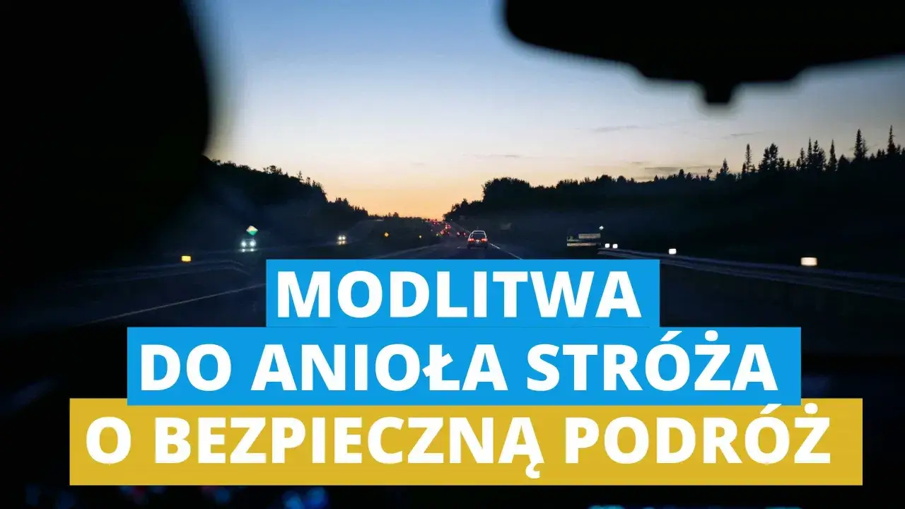 Droga nocą, światła samochod&oacute;w i napis 