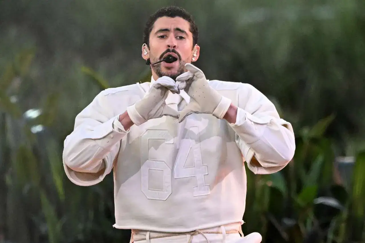 Bad Bunny's iconic bad bunny super bowl outfit features a white sweatshirt with