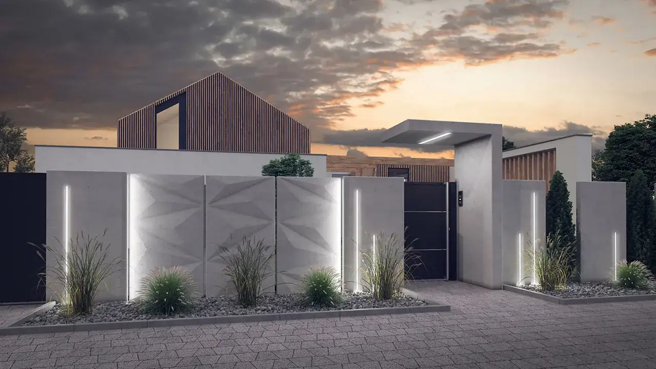 Nowoczesne ogrodzenie systemowe betonowe z geometrycznymi wzorami i subtelnym oświetleniem LED, otaczające elegancką posesję.