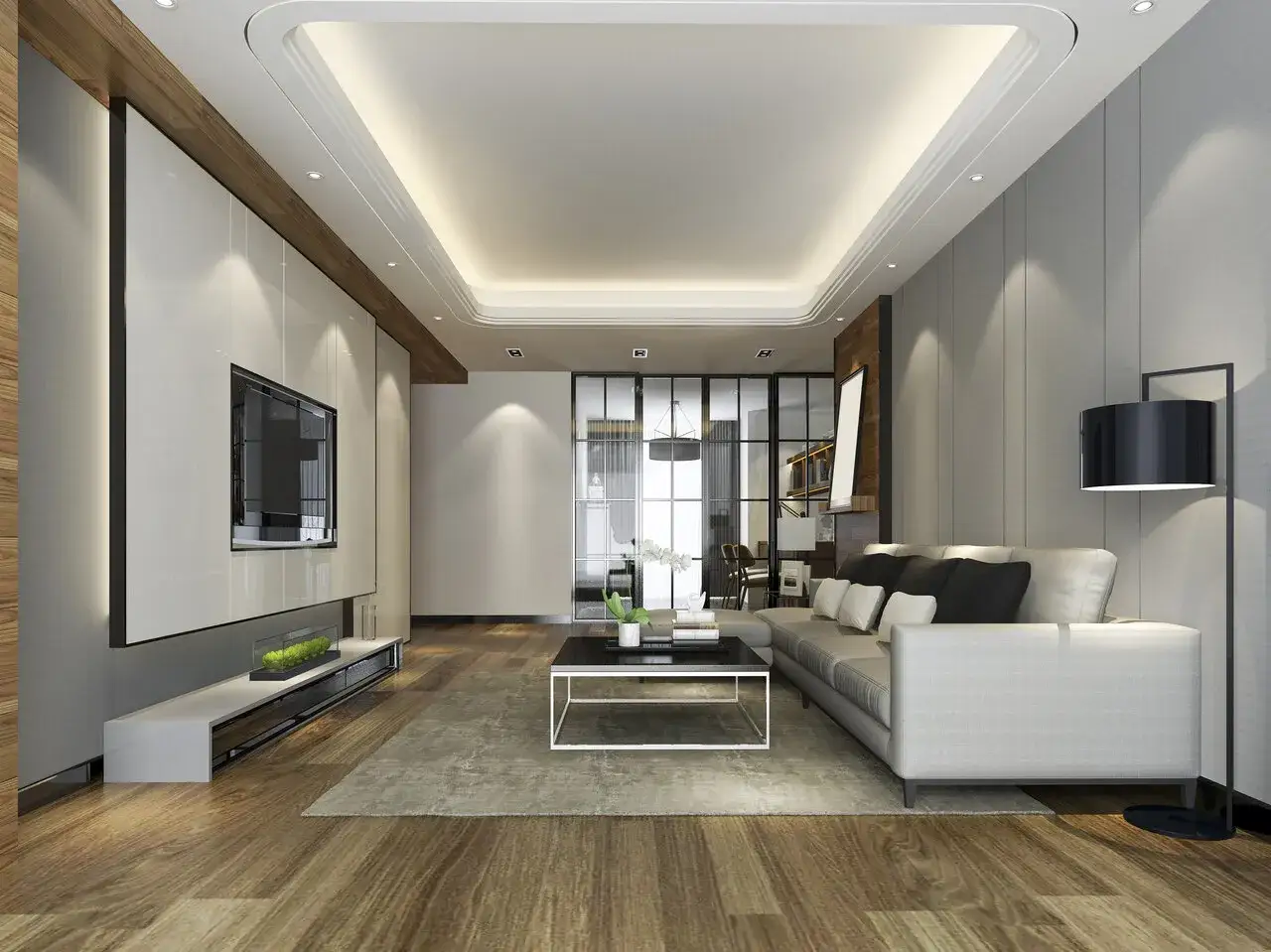 Nowoczesny salon z podwieszanym sufitem, kt&oacute;ry stanowi świetny pomysł na sufit w pokoju. Oświetlenie LED tworzy ciepłą atmosferę.