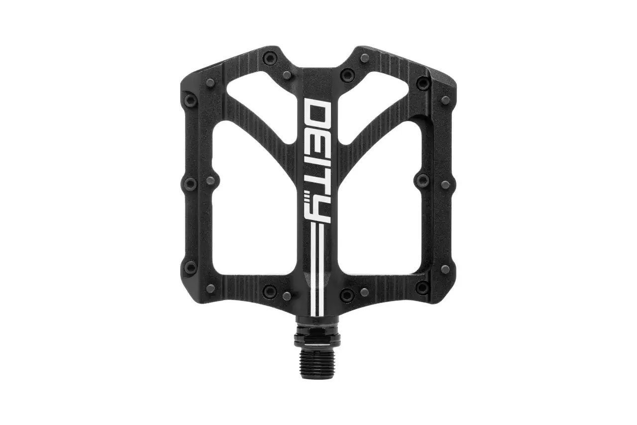 A black Deity Bladerunner bicycle pedal with a minimalist design and white accents.