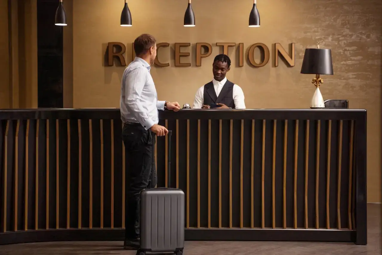hotel reception desk, direct booking, hotel website