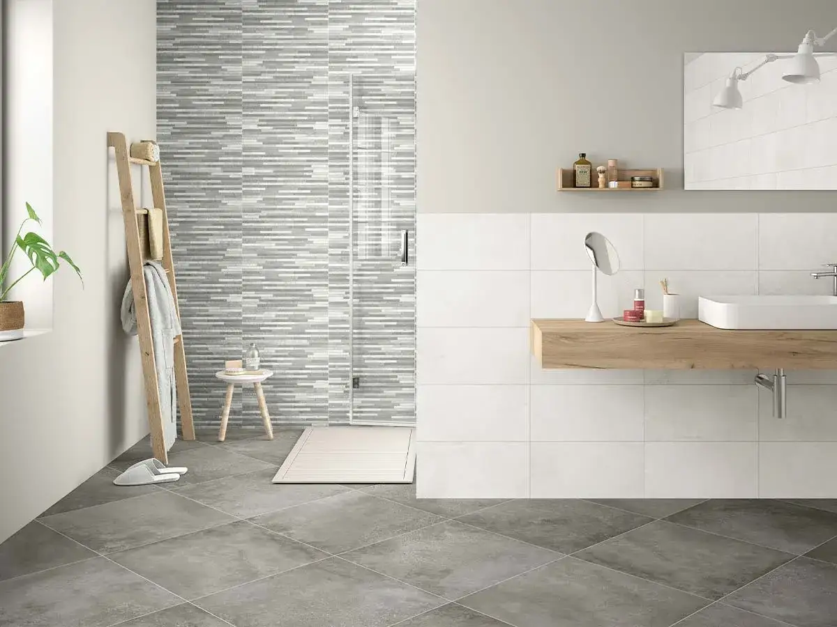 Ba&ntilde;o moderno con azulejos grises y blancos. Ideas para como limpiar azulejos ba&ntilde;o y mantenerlos impecables.