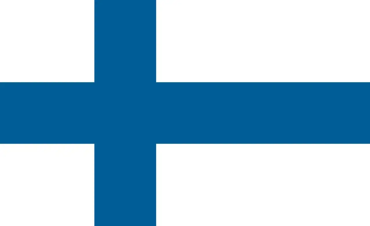 Flaga z niebieskim krzyżem na białym tle. Symbolizuje Finlandię, kraj tysiąca jezior i lasów.