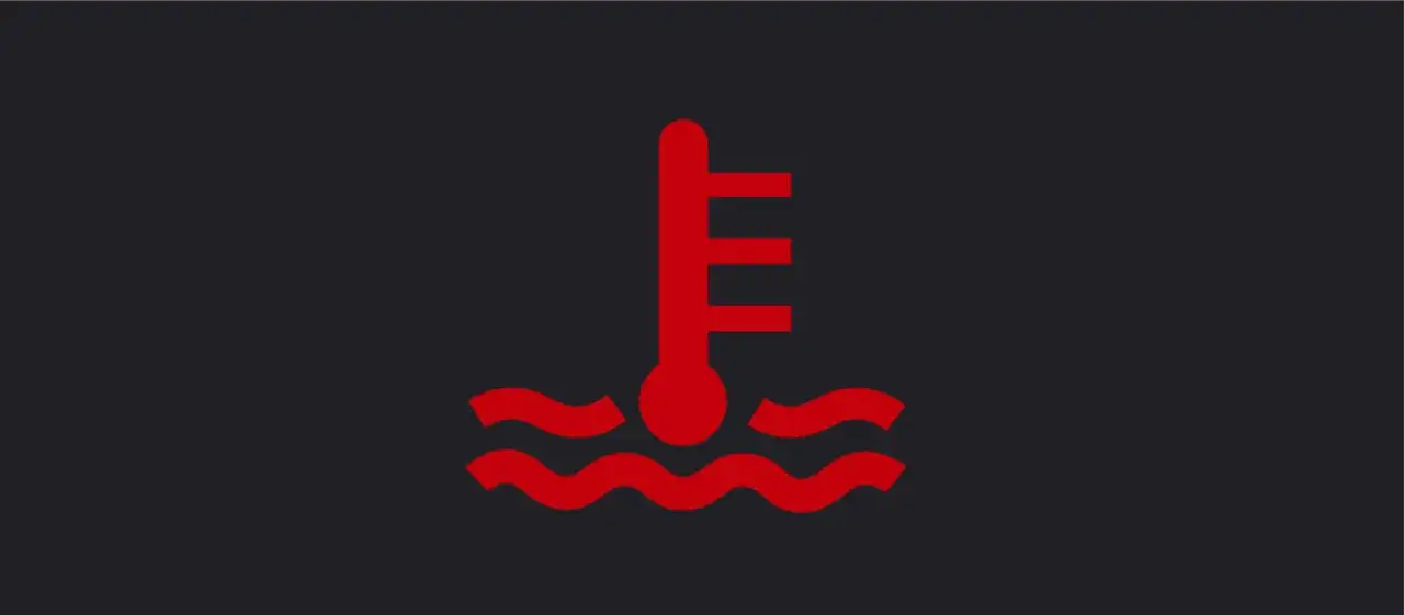 Icono de termómetro rojo sobre olas, indicando nivel refrigerante bajo. ¡Atención!