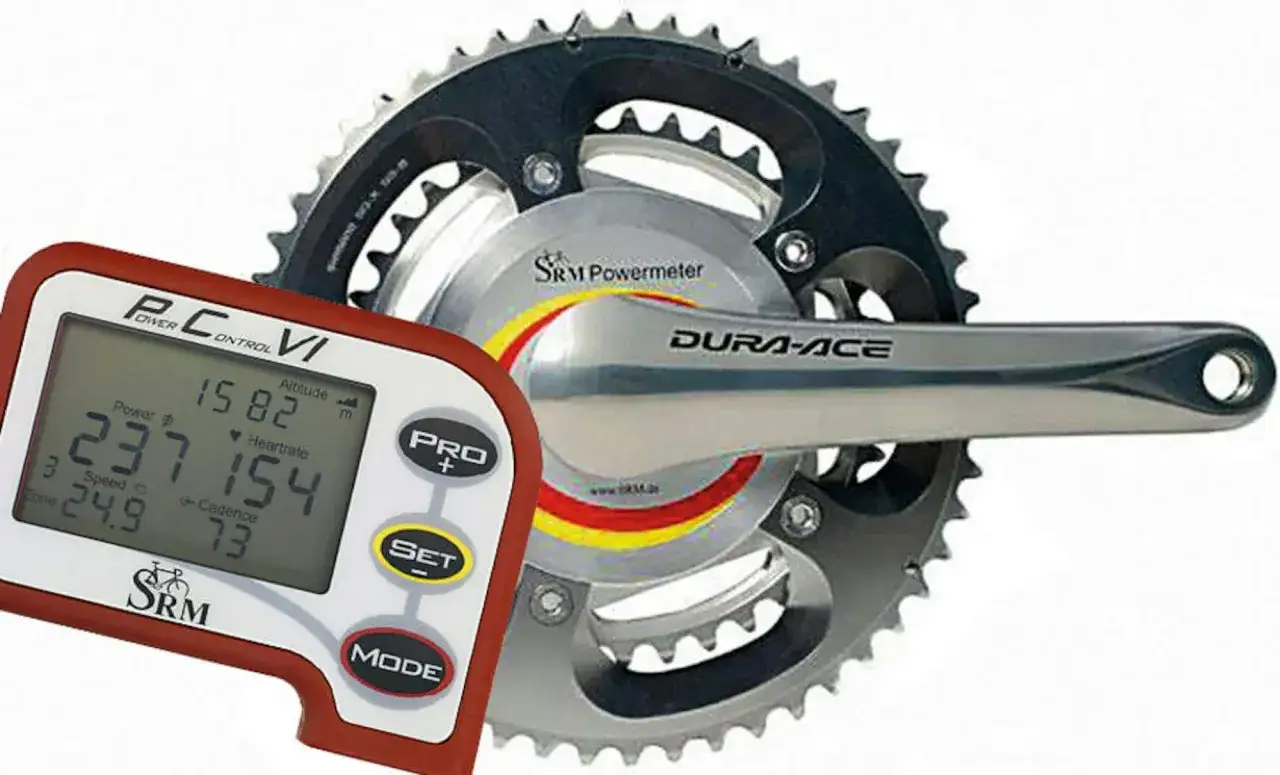 Pomiar mocy w pedałach: licznik SRM Power Control VI pokazuje 237W mocy, 154 uderzeń serca i 73 obroty korbą. Obok korba Dura-Ace.