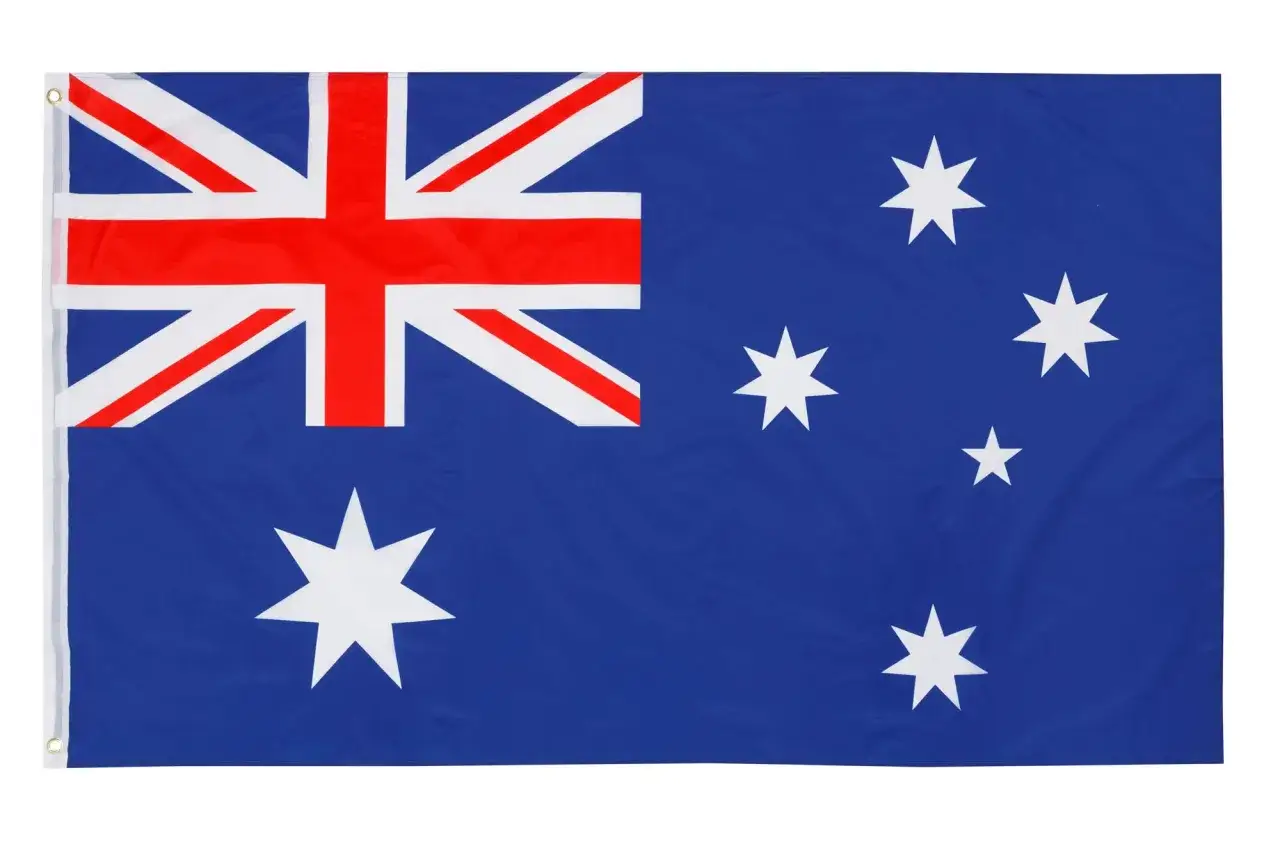 Błękitna flaga Australii z Krzyżem Południa i flagą Wielkiej Brytanii w lewym górnym rogu.