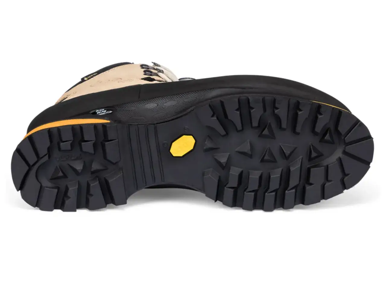 A hiking boot with a deep lugged Vibram sole, designed for maximum grip. The bottom of the shoes is sticky, ensuring stability on any terrain.