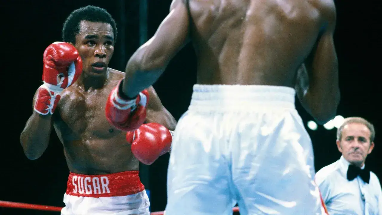 Sugar Ray Leonard, in his iconic red gloves and