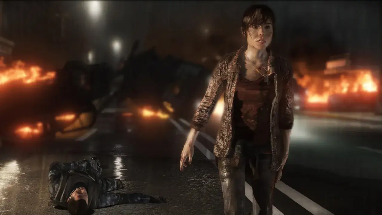 Jodie Holmes stoi na tle płonących samochodów, obok leży nieprzytomny żołnierz. To mroczny moment z gry Beyond Two Souls, czas gry pełen akcji.