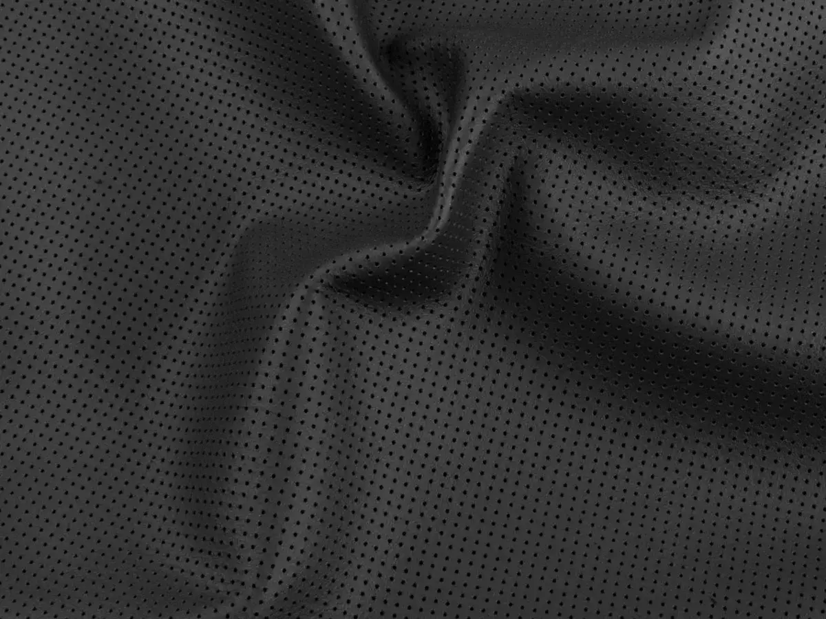 Drapé de cuir napa noir perforé, texture douce et souple, idéal pour des vêtements élégants et respirants.
