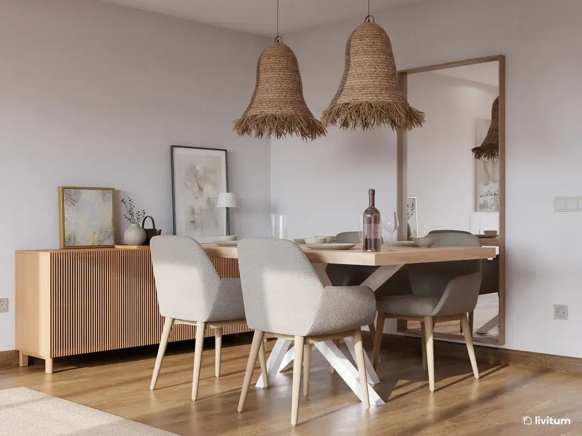 Elegante decoracion comedor peque&ntilde;o con mesa de madera, sillas grises y l&aacute;mparas de mimbre. Un espejo grande ampl&iacute;a el espacio.