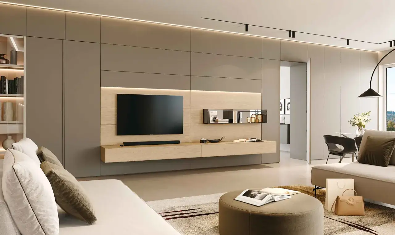 Parete soggiorno moderna con TV a schermo piatto, mensole a muro e illuminazione a LED. Un'ispirazione per idee pareti soggiorno moderne.