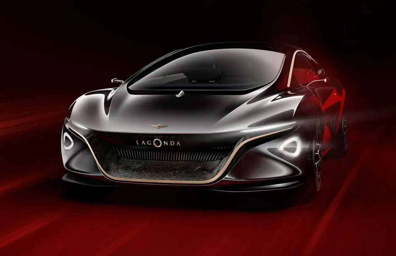 Przyszłość motoryzacji w wydaniu Aston Martin Lagonda. Futurystyczny, luksusowy sedan o aerodynamicznej sylwetce, z charakterystycznym grillem i ostrymi światłami LED.