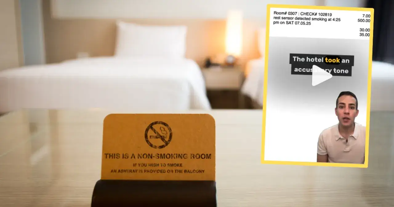 Na stoliku w hotelowym pokoju stoi tabliczka
