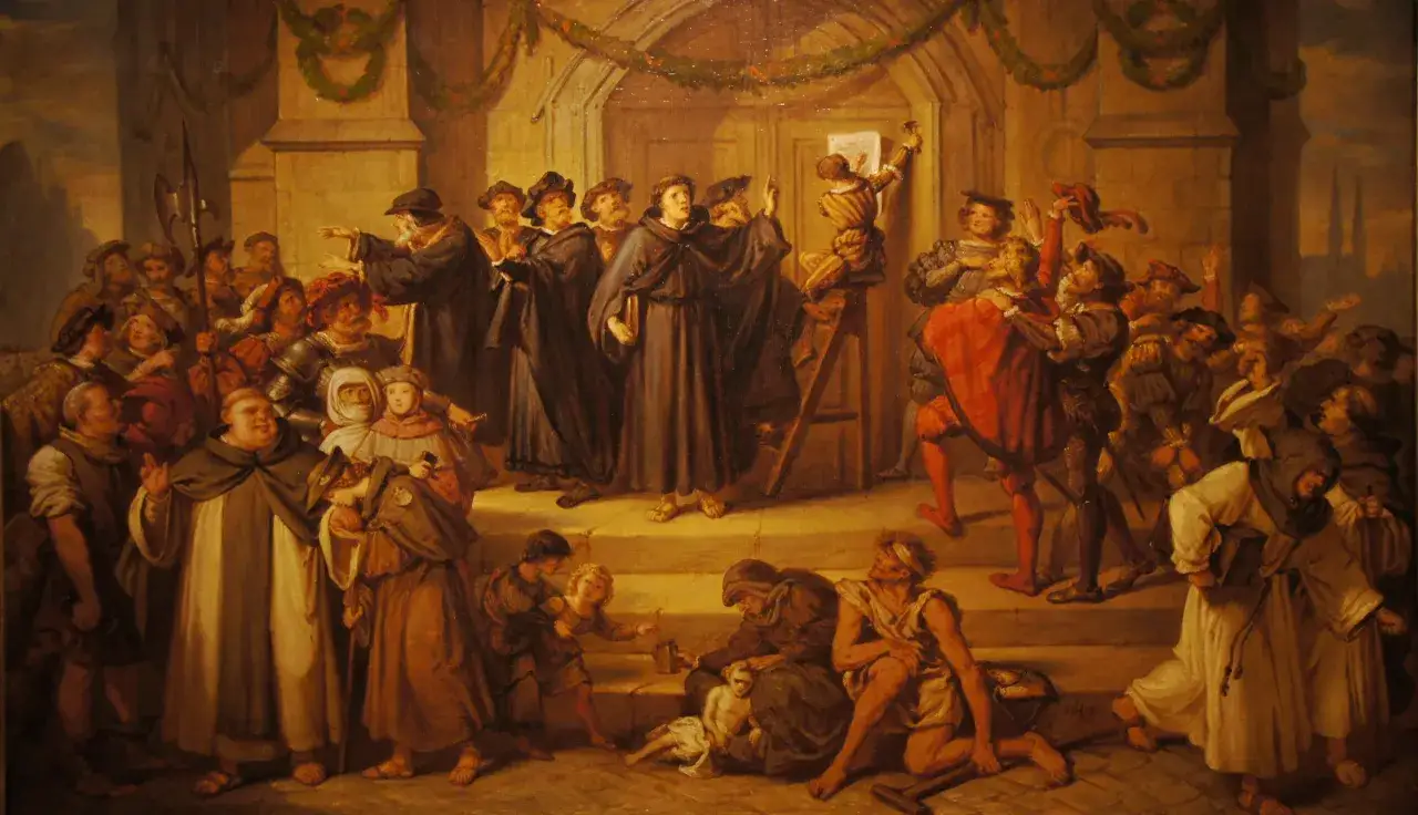 A crowd gathers as a man nails a document to a door, symbolizing the sola scriptura meaning of the Bible as the sole authority.
