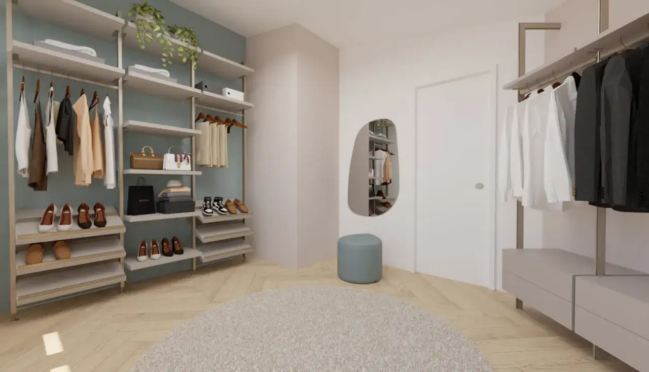 Idee per come costruire una cabina armadio: scaffali a vista, appendiabiti, scarpiere e un pouf blu.