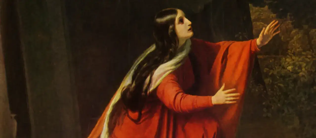 Maria von Magdala, in rotem Gewand, blickt verzweifelt zum Himmel, ihre Hand ausgestreckt.