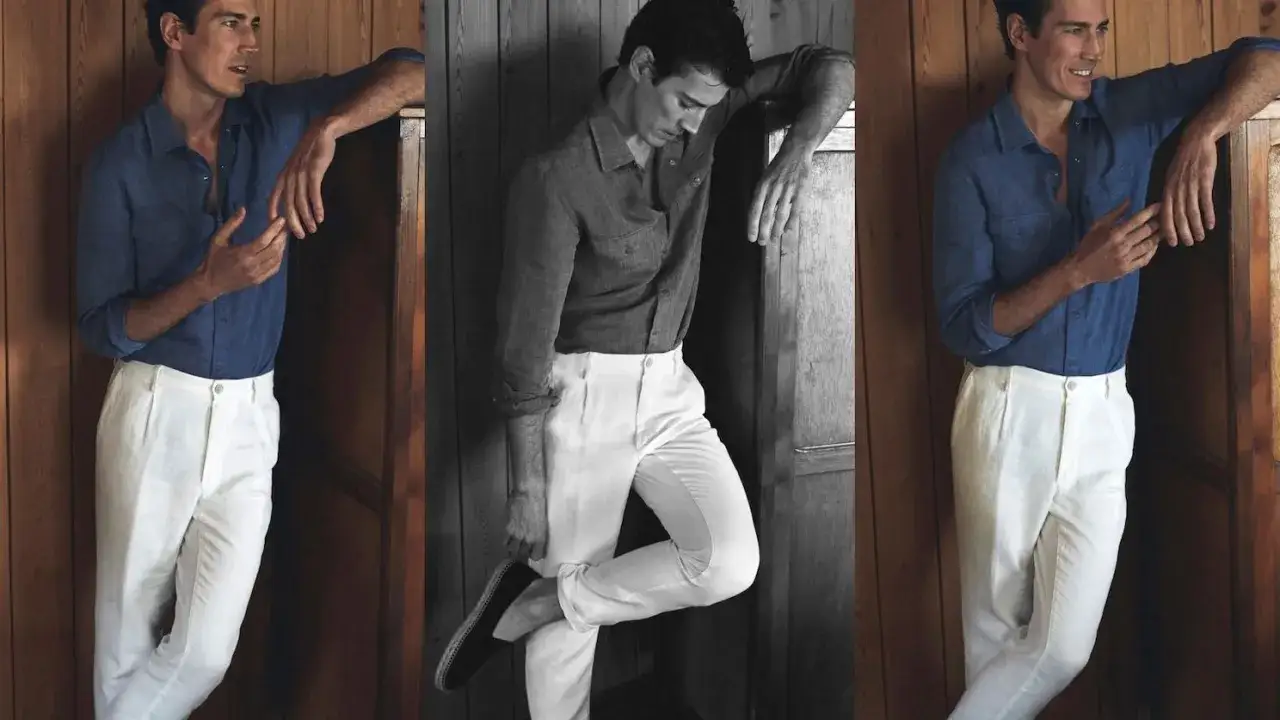 Hombre con camisa azul y pantal&oacute;n blanco, un look ideal que combinar con pantal&oacute;n blanco hombre para un estilo veraniego.