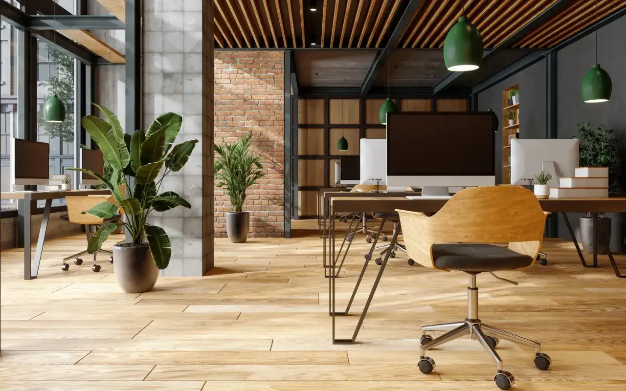 Espacio de oficina moderno con plantas, ladrillo expuesto y madera. Un ejemplo de flex living para un ambiente de trabajo inspirador.
