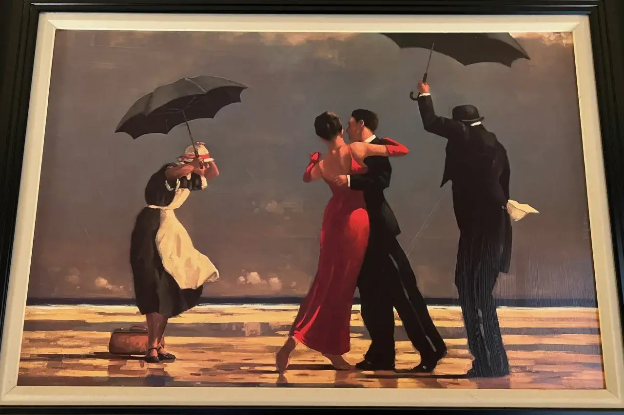 A couple dances in the rain while a maid holds an umbrella. The singing butler, in formal wear, also shields himself from the downpour.