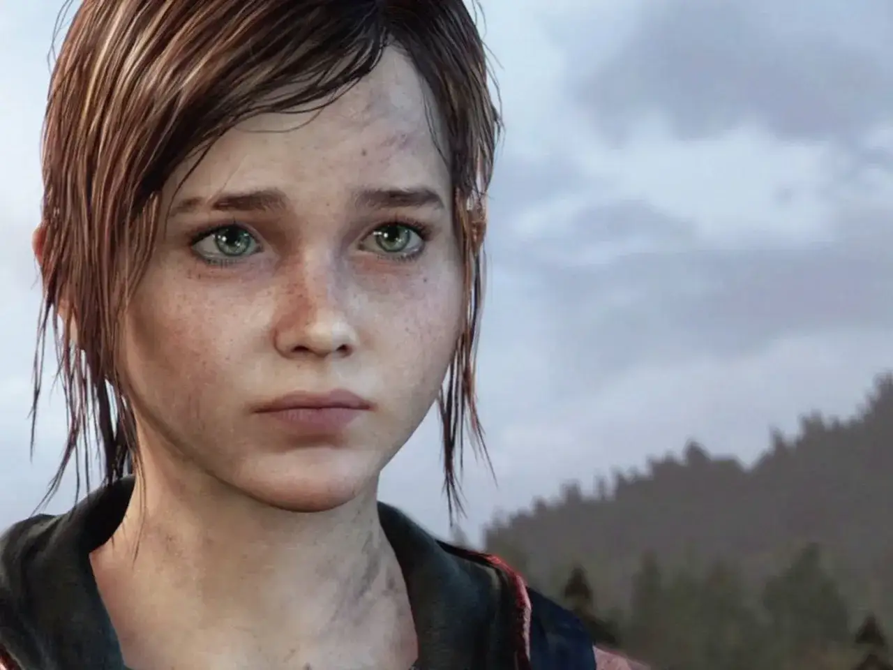 Twarz Ellie z The Last of Us, z zielonymi oczami i piegami. Gra oferuje wiele godzin emocjonującej przygody.
