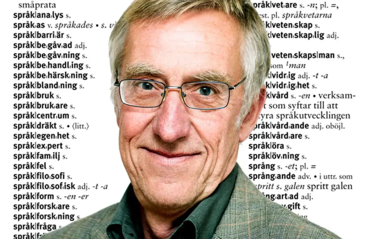 En leende man med glasögon, omgiven av ord från en ordbok. En person att **se upp till** för sin kunskap om språk.