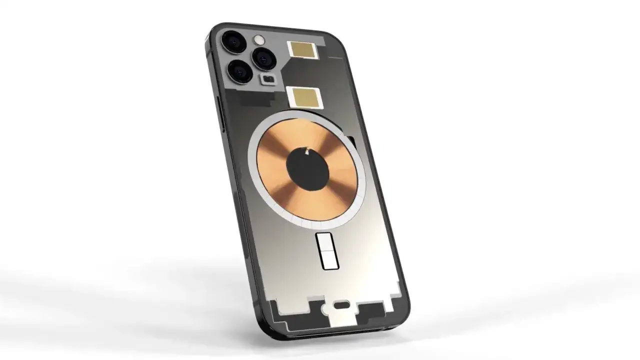 Widok wnętrza iPhone'a 13, ukazujący cewkę do ładowania indukcyjnego.