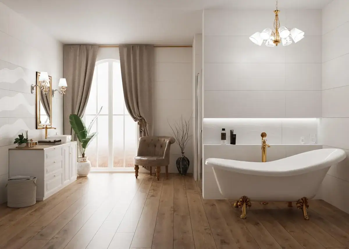 Elegancka łazienka w stylu francuskim z wolnostojącą wanną na złotych łapach, marmurowymi płytkami i złotymi dodatkami.