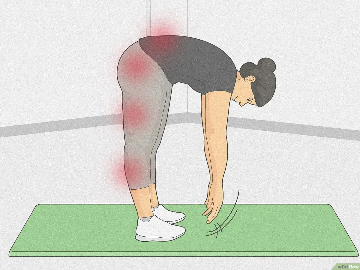 Donna piegata in avanti su un tappetino, con aree rosse che indicano tensione. Forse &egrave; per questo che non riesco a toccare le punte dei piedi.