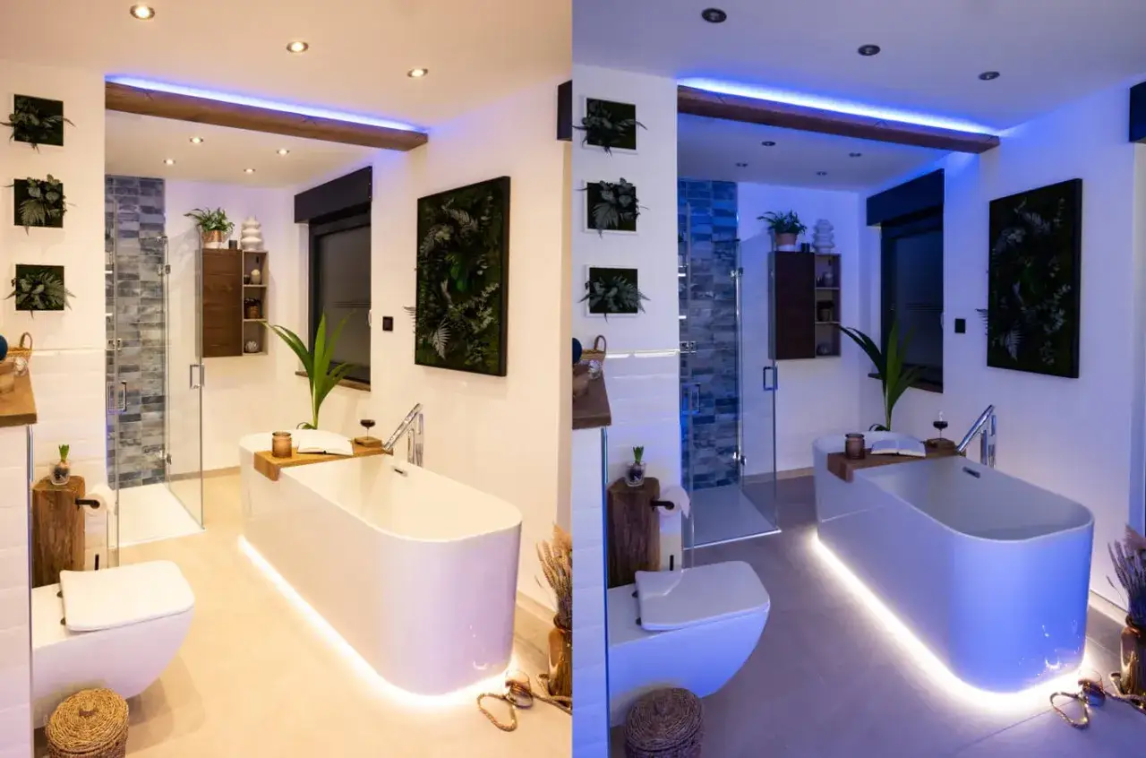 Nowa łazienka z wanną i prysznicem. Jaka barwa światła do łazienki? Ciepłe, białe światło tworzy przytulną atmosferę, a niebieskie dodaje nowoczesności.