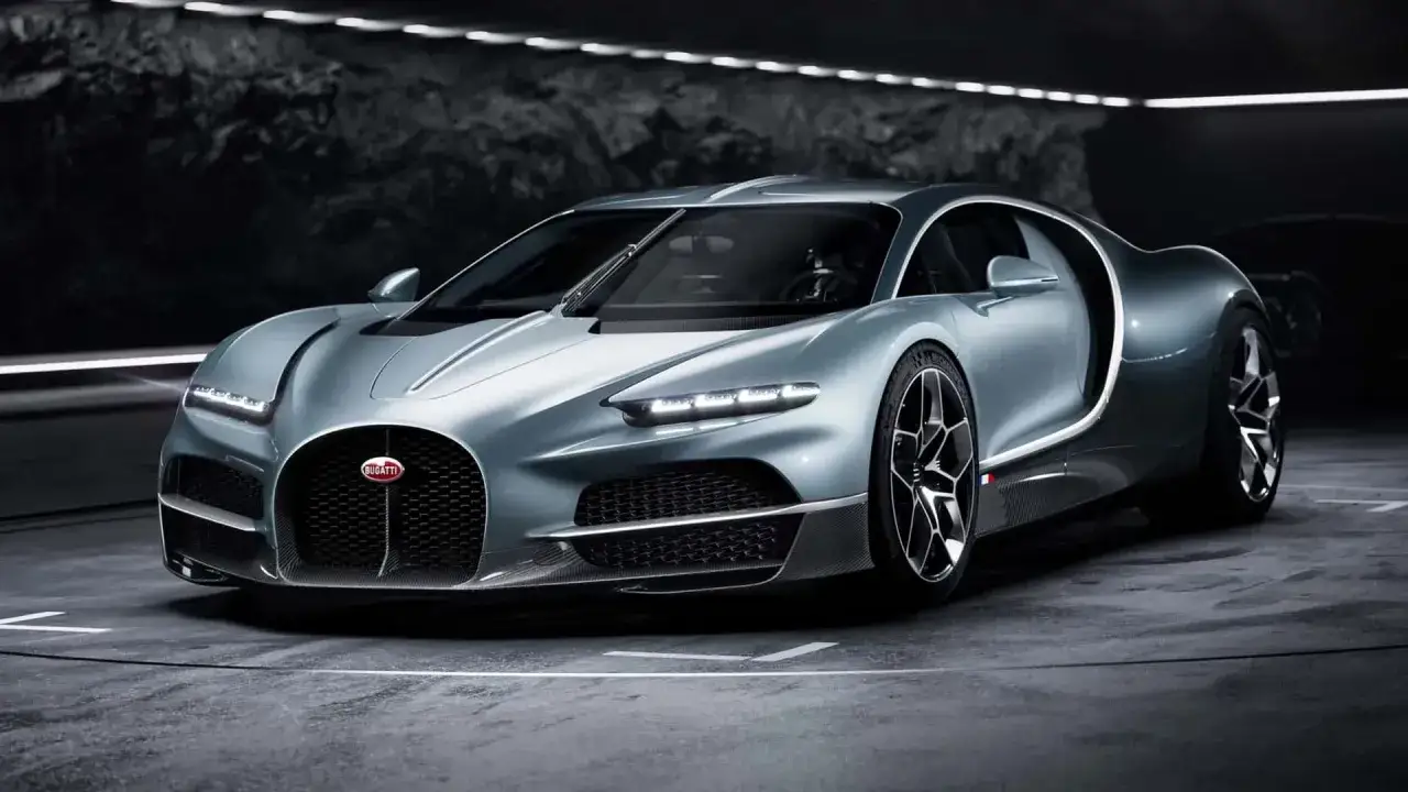 Srebrny Bugatti Chiron w nowoczesnym wnętrzu. Zastanawiasz się nad bugatti cena? To marzenie wielu.