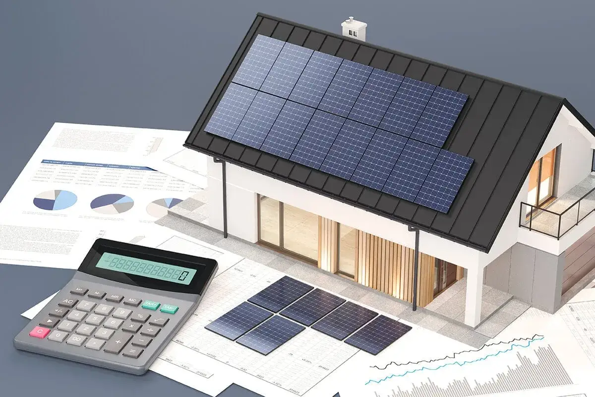 Calculatrice et maison avec panneaux photovolta&iuml;ques. Combien de panneaux photovolta&iuml;ques pour 5000 kw ? Analyse des co&ucirc;ts et de la rentabilit&eacute;.