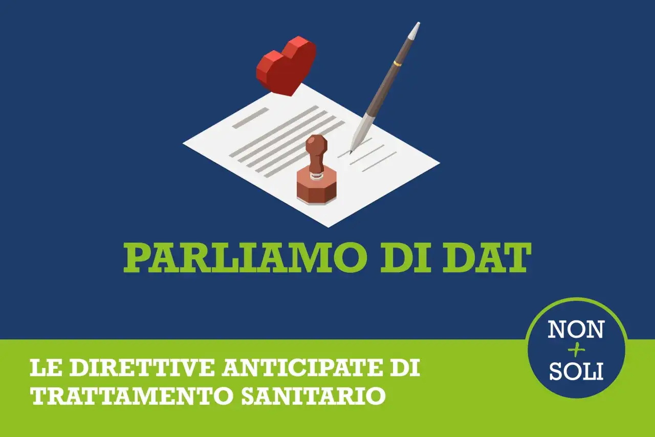Parliamo di DAT, direttive anticipate di trattamento sanitario. Un cuore rosso, una penna e un timbro su un documento simboleggiano la volontà di esprimere le proprie scelte mediche.