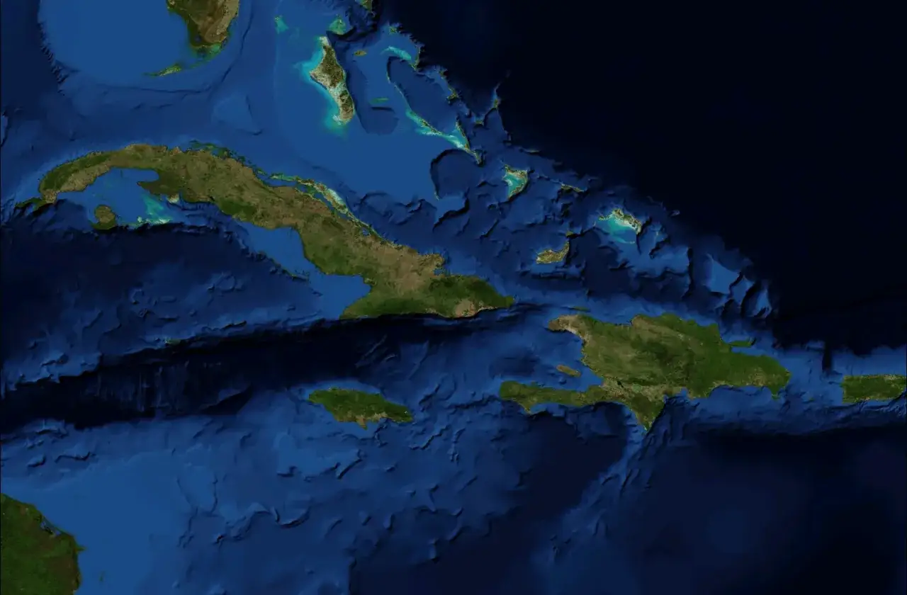 Widok satelitarny Wielkich Antyli: Kuba, Jamajka, Haiti i Dominikana otoczone turkusowymi wodami i głębokim oceanem.