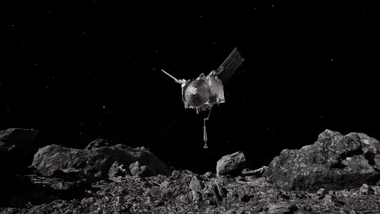 OSIRIS-REx sv&auml;var &ouml;ver Bennu. Rymdsonden n&auml;rmar sig asteroidens steniga yta f&ouml;r att samla prover.