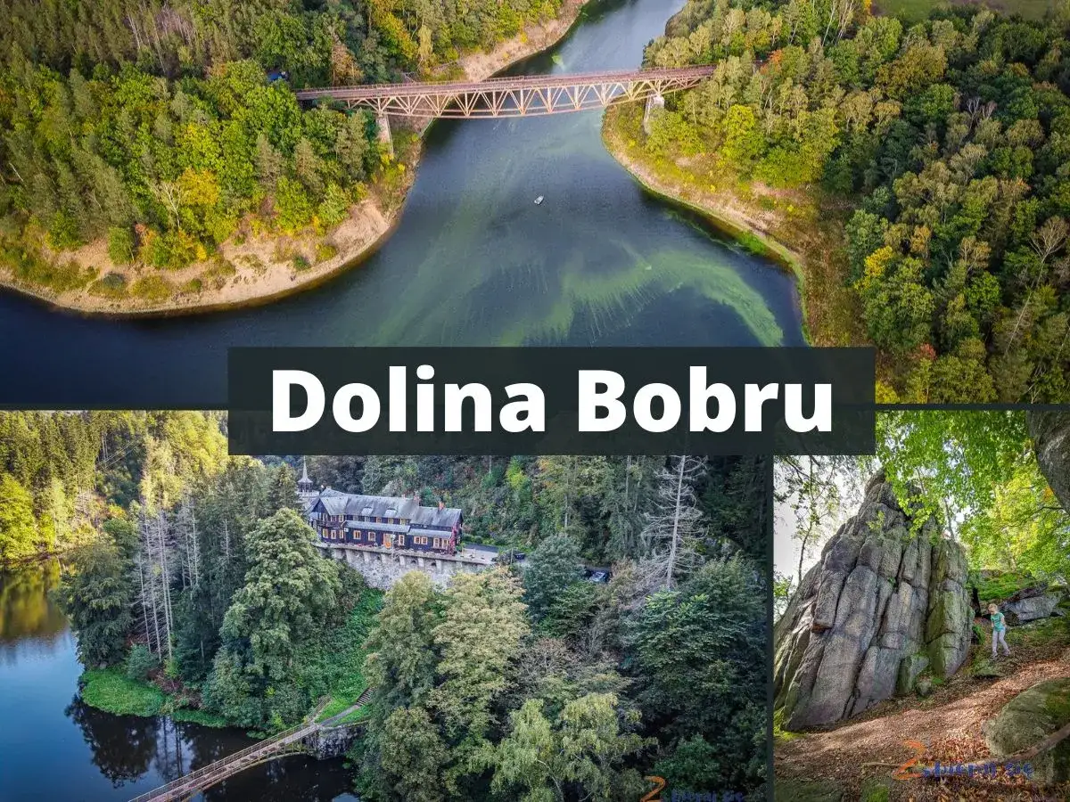 Malowniczy park krajobrazowy Dolina Bobru z mostem kolejowym nad rzeką, zabytkowym budynkiem i skalnymi formacjami.