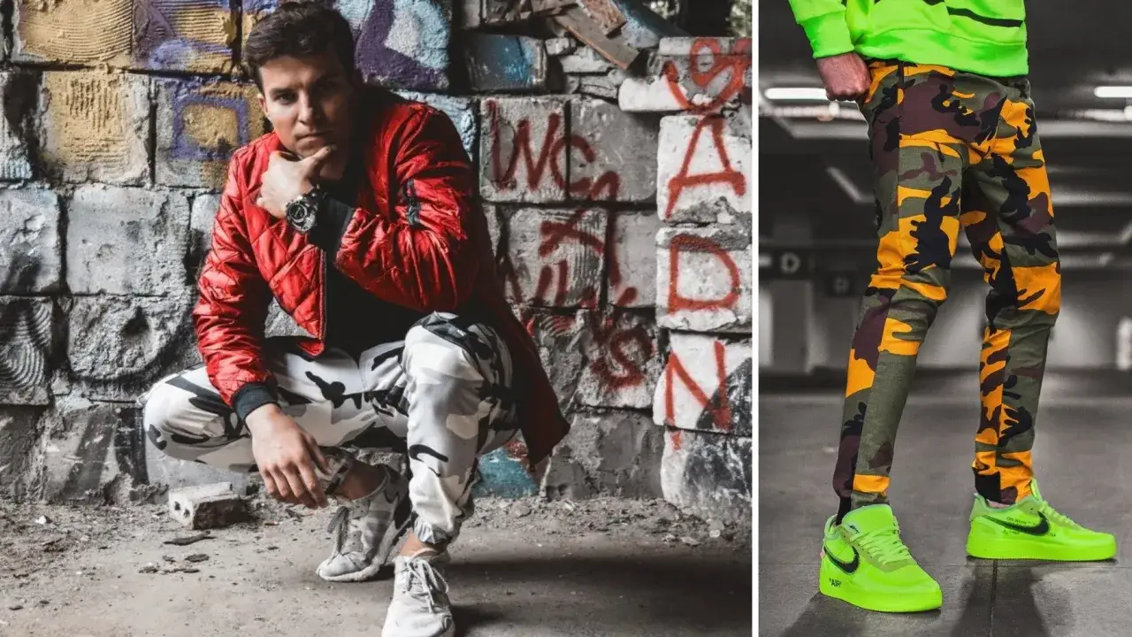 Mężczyzna w czerwonej kurtce i spodniach moro siedzi na tle graffiti. Obok, nogi w jaskrawozielonych butach i spodniach moro.