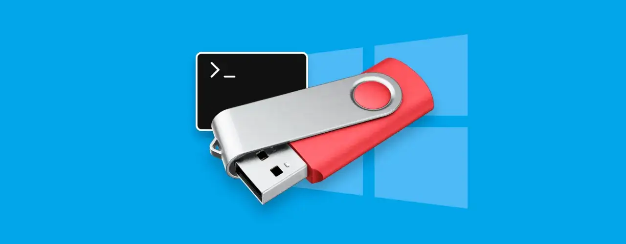 Czerwony pendrive obok czarnego okna konsoli, symbolizujące jak odczytać pendrive na laptopie.