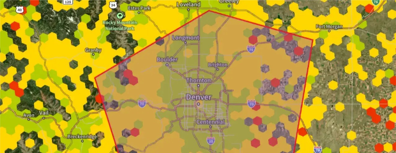 Map showing Denver and surrounding areas with hexagonal overlays indicating mobile network optimization status. Red hexagons suggest areas needing attention.