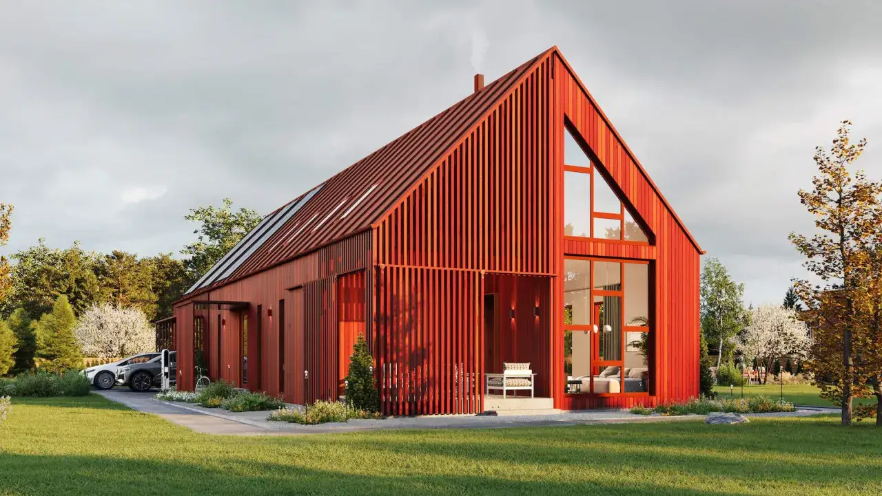 Rött trähus med stora fönster och takfönster. Modern utbyggnad hus inspiration med en bil parkerad utanför.