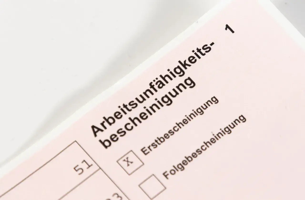 Arbeitsunfähigkeitsbescheinigung. Ein Kreuz bei
