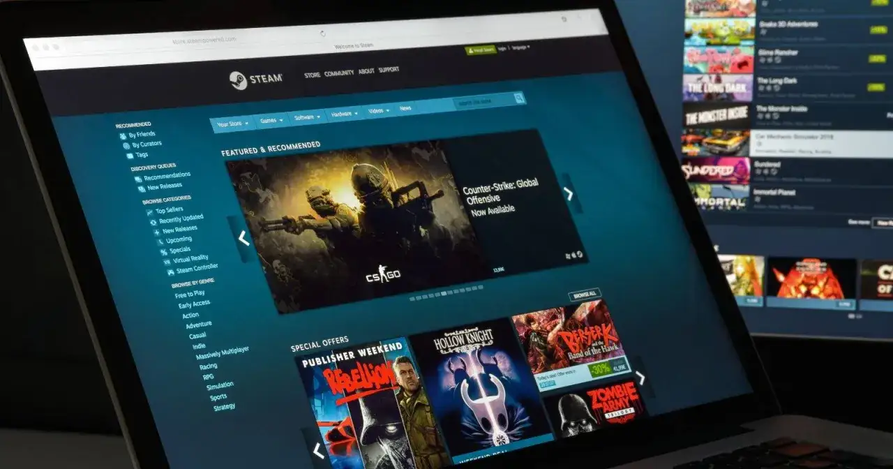 Szukasz darmowe gry na Steamie? Na ekranie laptopa widać stronę sklepu Steam z grami, promocjami i kategoriami.