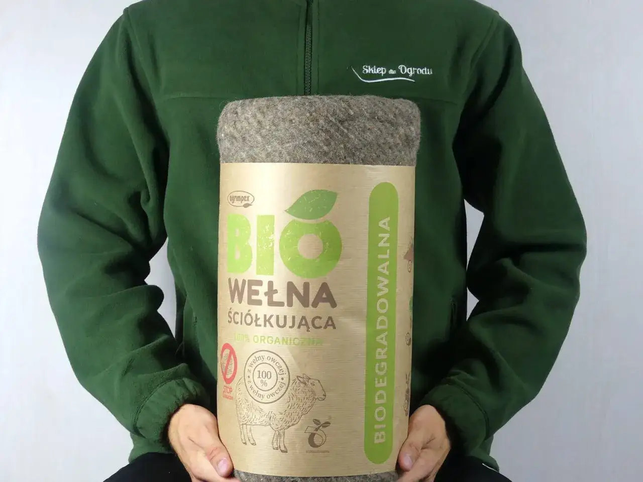 Rolka wełnianej biowłókniny do ściółkowania, 100% organiczna, z wizerunkiem owcy. Idealna dla ogrodu.