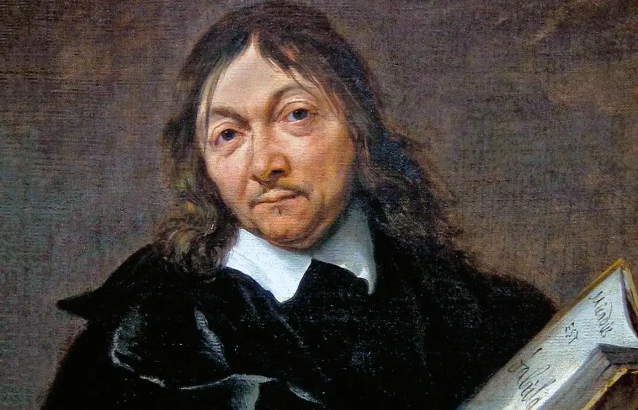 Portret mężczyzny w czarnym stroju z białym kołnierzem, trzymającego księgę. Jego spojrzenie sugeruje głębokie myśli, jakby potwierdzał: cogito ergo sum.