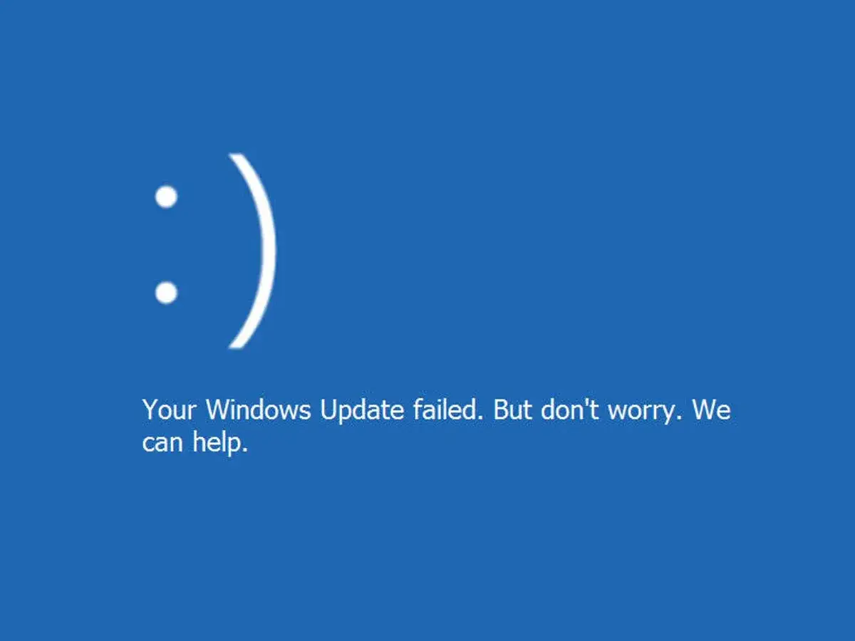 Pantalla azul de Windows con un smiley y mensaje 
